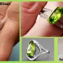 Elegant peridot ring with vibrant green gemstone set in gold, symbolizing renewal and positive energy