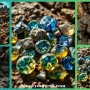 Close-up of a rare Parti sapphire gemstone showcasing vibrant bi-color and tri-color zoning in blue, green, and yellow, polished to perfection, reflecting light with dazzling clarity, luxury gemstone photography